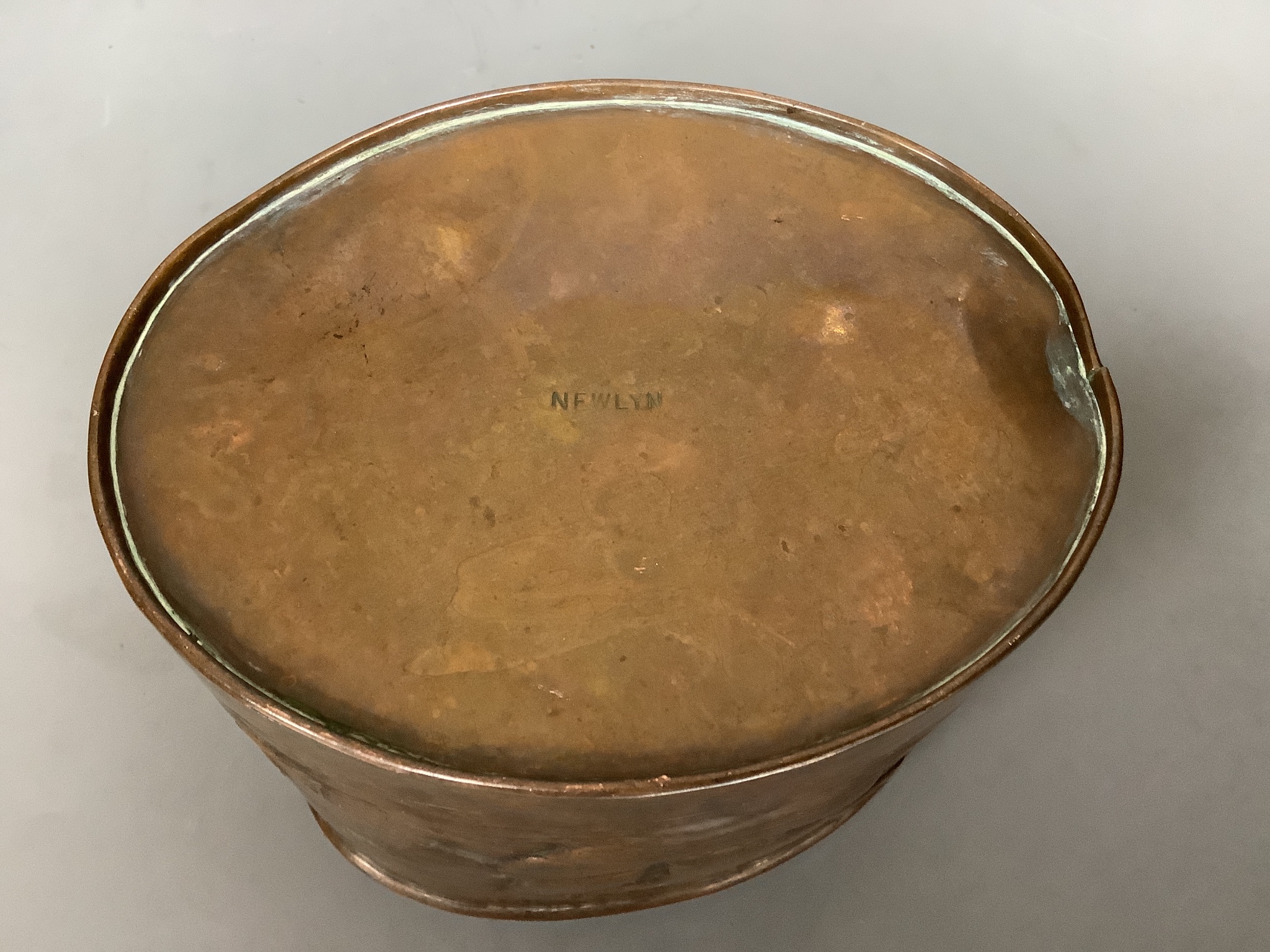 A Newlyn oval copper seascape jar 15cm